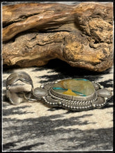 Load image into Gallery viewer, Raymond Delgarito, Navajo silversmith - Blue Gem ribbon turquoise pendant
