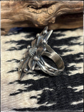 Load image into Gallery viewer, Jaunita Long, Navajo silversmith. Sterling silver starbust ring with an adjustable band.
