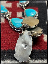 Load image into Gallery viewer, Freda Martinez, Navajo silversmith.  sterling silver and Kingman turquoise Y necklace set.  Hallmark stamp.