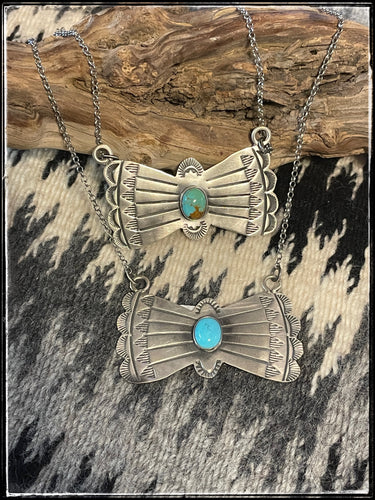 Rick Enriquez, sterling silver and kingman turquoise bowtie necklace on a 16