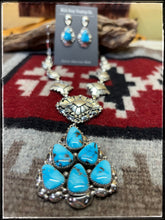 Load image into Gallery viewer, Clem Nalwood Navajo silversmith.  Sterling silver and Kingman turquoise cluster necklace set.