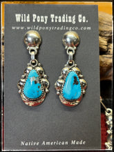 Load image into Gallery viewer, Clem Nalwood Navajo silversmith.  Sterling silver and Kingman turquoise cluster necklace set.  Earrings, close up.