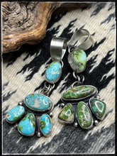 Load image into Gallery viewer, Betty Tom, Navajo silversmith. Sonoran Gold pendants in light blue and deepp green. 
