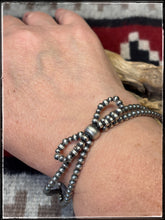 Load image into Gallery viewer, Double strand, bow bead bracelet.  Machine blown, sterling silver, 4mm beads.