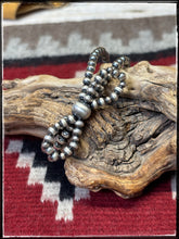 Load image into Gallery viewer, Double strand, bow bead bracelet.  Machine blown, sterling silver, 4mm beads.