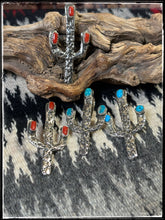 Load image into Gallery viewer, Del Arviso, Navajo silversmith. Tufa cast cactus pendants with a shepherd hook. Options come in coral or turquoise.