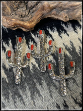Load image into Gallery viewer, Del Arviso, Navajo silversmith. Tufa cast cactus pendants with a shepherd hook. Options come in coral or turquoise.