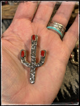 Load image into Gallery viewer, Del Arviso, Navajo silversmith. Tufa cast cactus pendants with a shepherd hook. Options come in coral or turquoise.