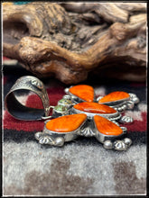 Load image into Gallery viewer, Rosella Paxson, Apache artist. Sterling silver and Orange Spiny butterfly pendant.