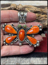 Load image into Gallery viewer, Rosella Paxson, Apache artist. Sterling silver and Orange Spiny butterfly pendant.