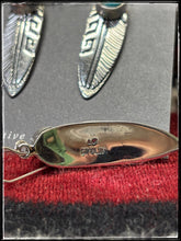 Load image into Gallery viewer, Sterling silver and Sonoran Gold turquoise stones, on overlay feather earrings on French wires. Navajo handmade. Hallmark stamp.