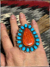 Load image into Gallery viewer, Sterling silver, Sleeping Beauty turquoise, and orange spiny oyster shell ring from Navajo silversmith Ernest Roy Begay. 
