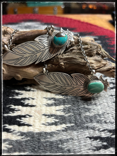 Sterling silver and Kingman turquoise, laser cut feather necklaces on a 16