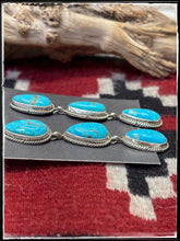 Load image into Gallery viewer, Trisha Largo, Navajo silversmith.  Sterling silver and Kingman turquoise triple teardrop earrings. 
