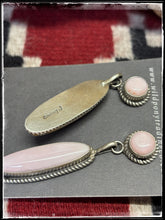 Load image into Gallery viewer, Judith Dixon, Navajo silversmith. Sterling silver and pink conch shell earrings. Hallmark stamp. 
