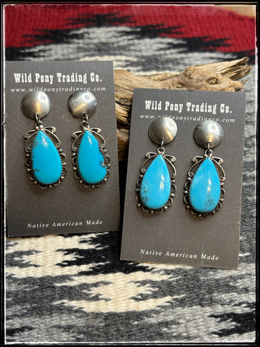 Freda Wilson, Navajo silversmith.  Turquoise drop earrings with silver disc stud posts  