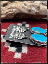 Load image into Gallery viewer, Blaine Yellowhorse, Navajo silversmith.  Sterling silver and Kingman turquoise concho drop earrings
