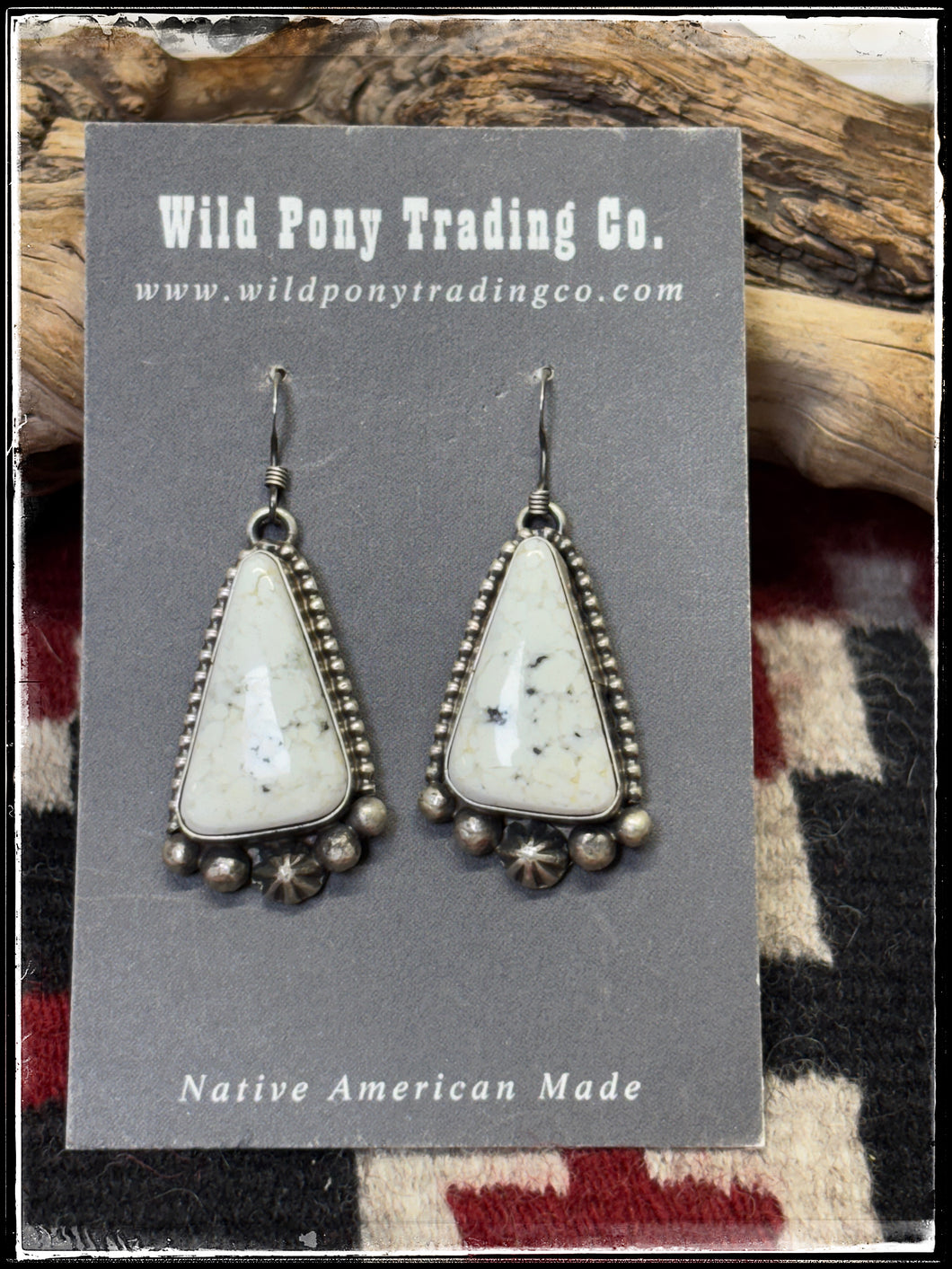 Blaine Yellowhorse, Navajo silversmith. Sterling silver and white buffalo stones on French wires. 