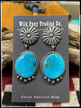 Load image into Gallery viewer, Blaine Yellowhorse, Navajo silversmith.  Sterling silver and Kingman turquoise concho drop earrings
