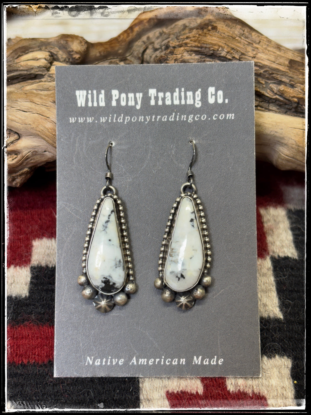 Blaine Yellowhorse, Navajo silversmith. Sterling silver and white buffalo stone on french wires.