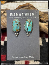 Load image into Gallery viewer, Judith Dixon, Navajo silversmith.  Sterling silver and Kingman turquoise, post style oblong studs. 
