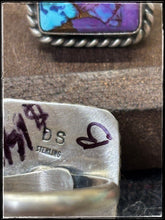 Load image into Gallery viewer, Donovan Skeets, Navajo silversmith.  Sterling silver and purple mojave composite stones with an adjustable ring band.   Hallmark stamp. 
