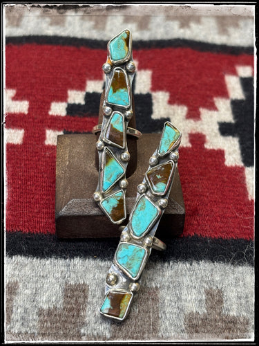 Jude Candelaria, Zuni silversmith.  Five stone, Kingman turquoise and sterling silver bar ring. 