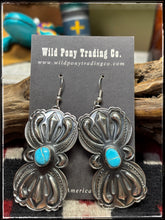 Load image into Gallery viewer, Roland Dixson, Navajo silversmith.  Sterling silver with heavy repousse work and turquoise center stones. 
