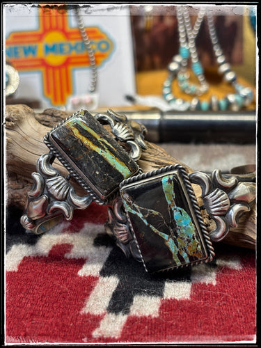 Juanita McDonald Navajo silversmith.  Sterling silver and Blackjack turquoise cuffs. 