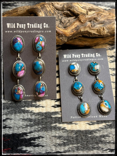 Freda Martinez, navajo silversmith.  Triple stone pink dahlia and kingman krush composite earrings 