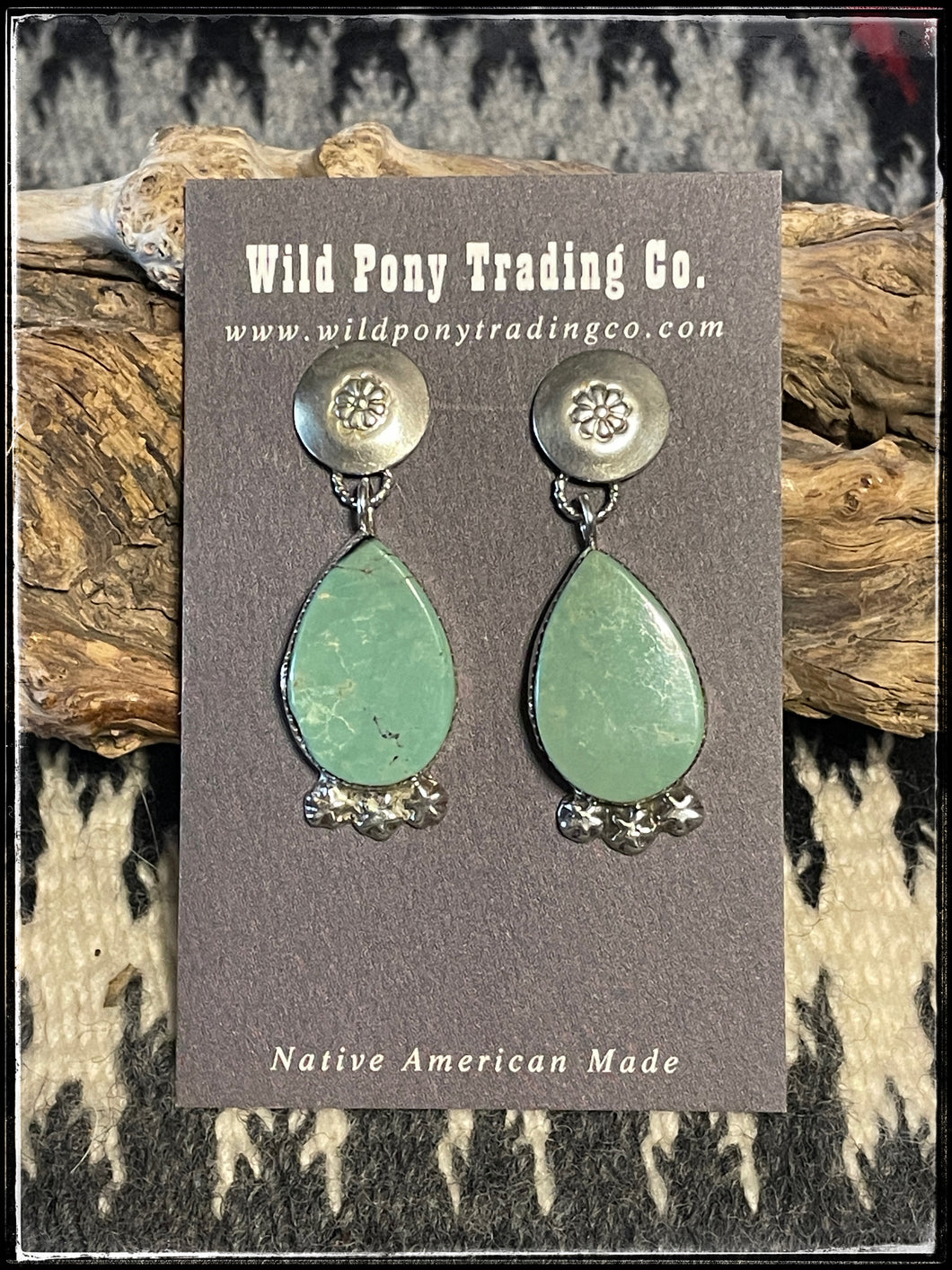 Selena Warner, sterling silver and turquoise earrings. Navajo made