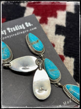 Load image into Gallery viewer, Trisha Largo, Navajo silversmith.  Sterling silver and Kingman turquoise triple teardrop earrings.   Hallmark stamp. 
