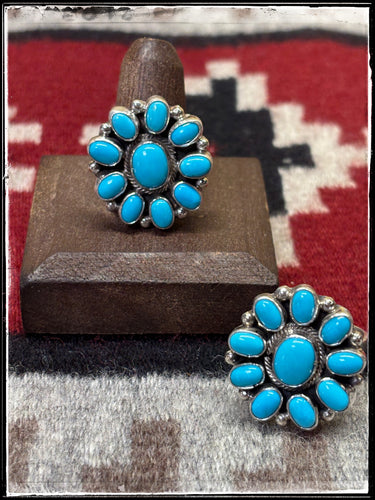 Travis Jim, Navajo silversmith.  Sterling silver ands turquoise mini cluster rings. 