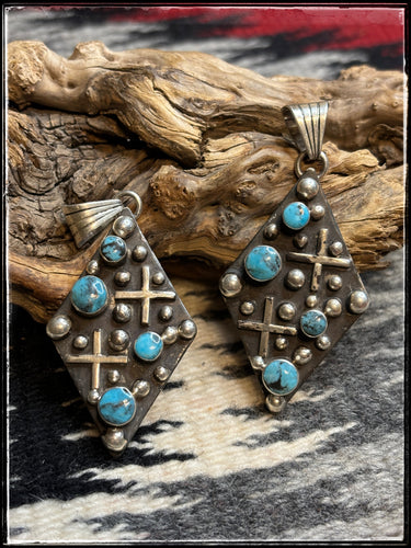 Sterling silver and turquoise, dot & cross pattern pendant with a small bail .