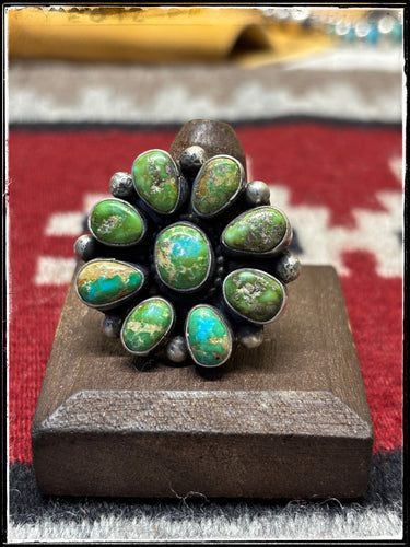 Travis Jim, Navajo silversmith.  Sonoran Gold and sterling silver cluster ring with an adjustable band. 