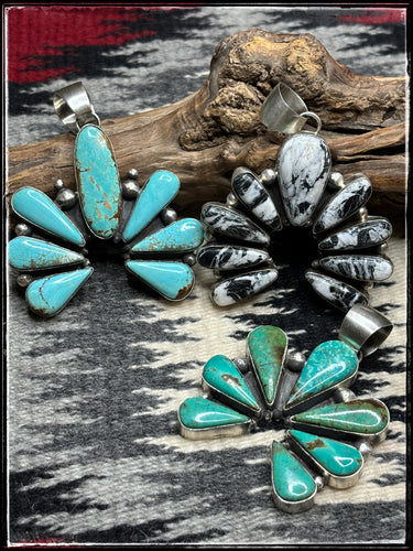 Robert Shakey, Navajo silversmith - Naja pendants in turquoise and or White Buffalo.