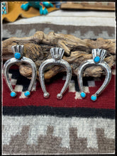 Load image into Gallery viewer, Del Areviso, Navajo silversmith.  Sterling silver and sleeping beauty turquoise on tufa cast Naja pendants with shepherd's hooks.
