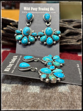 Load image into Gallery viewer, Debra Smith, Navajo silversmith.  Sterling silver and Kingman turquoise half cluster drop earrings. 
