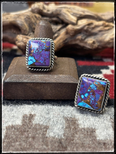 Donovan Skeets, Navajo silversmith.  Sterling silver and purple mojave composite stones with an adjustable ring band. 