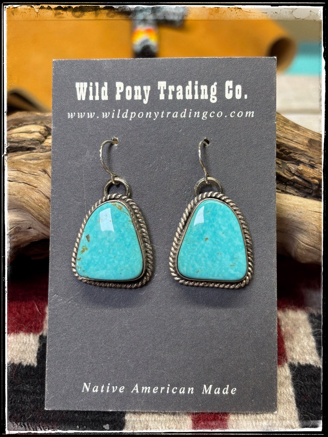 Dreama Yazzie, Navajo silversmith.  Sterling silver and turquoise drop earrings. 