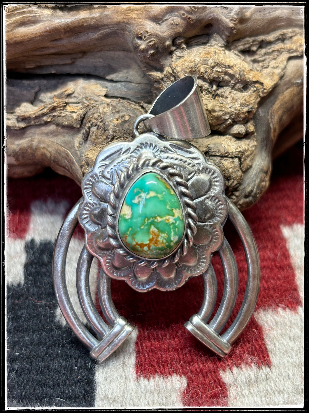 Sampson Etsitty, Navajo silversmith. Sterling silver and Sonoran Gold turquoise Naja pendants with a small (5mm) bail.