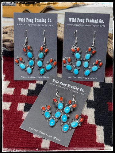 Sterling silver, Kingman turquoise, and corral cactus from Navajo silversmith Richard Yazza.
