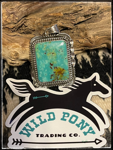 Sterling silver and turquoise pendant from Navajo silversmith  W. Denedale