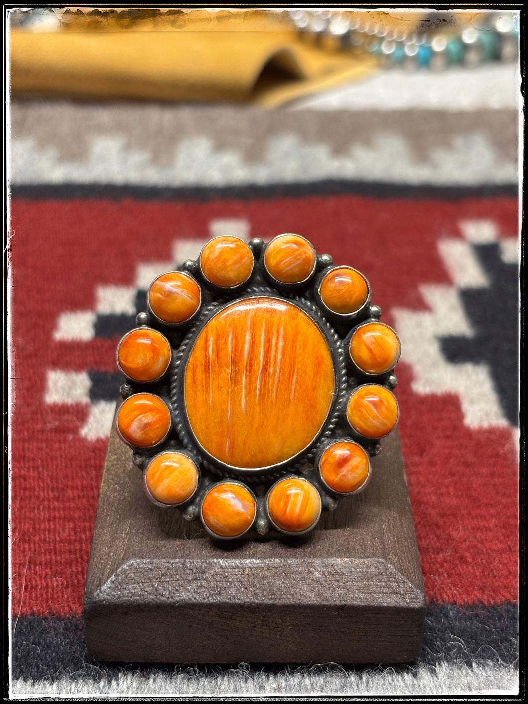 Dean Brown, Navajo silversmith. Orange spiny oyster shell cluster rings with adjustable bands.  Style B. 