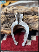 Load image into Gallery viewer, Del Areviso, Navajo silversmith.  Sterling silver and sleeping beauty turquoise on tufa cast Naja pendants with shepherd's hooks. Hallmark stamp. 
