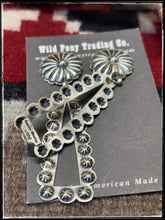 Load image into Gallery viewer, Eugene Charlie, Navajo silversmith.  Sterling silver concho and starshot earrings.   Hallmark. 
