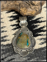 Load image into Gallery viewer, Raymond Delgarito, Navajo silversmith - Blue Gem ribbon turquoise pendant
