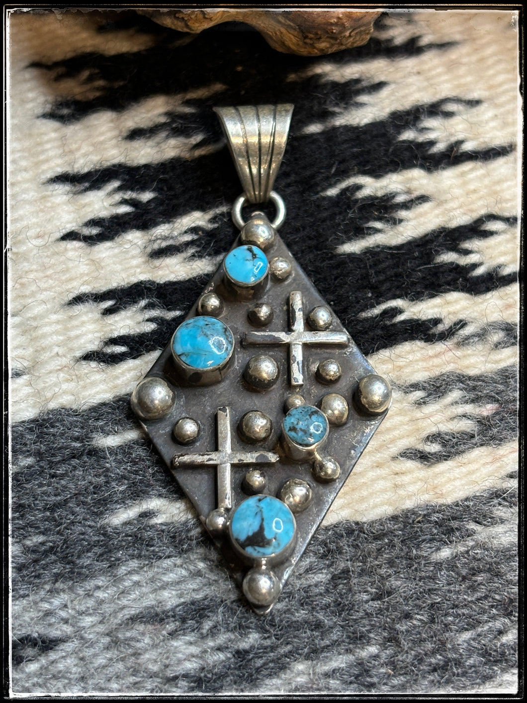 Sterling silver and turquoise, dot & cross pattern pendant with a small bail .B. 