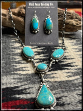 Load image into Gallery viewer, Augustine Largo, Navajo silversmith. Kingman turquoise Y necklace set with matching earrings. 
