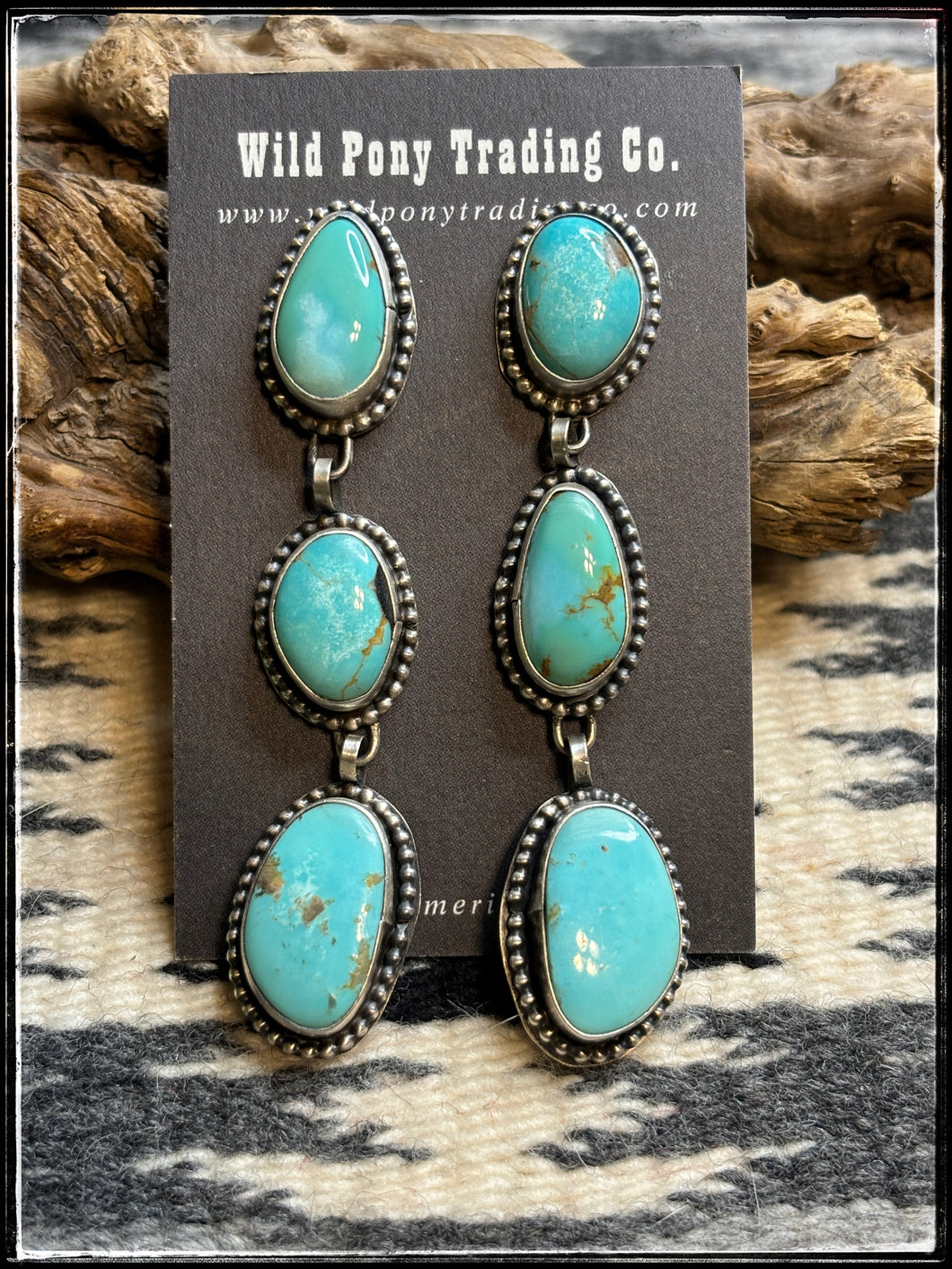 Chris Paul, Navajo silversmith.  Triple turquoise drop earrings with post backs. 